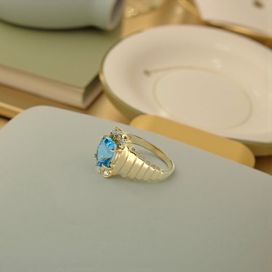 Blue Topaz and Diamond Ring