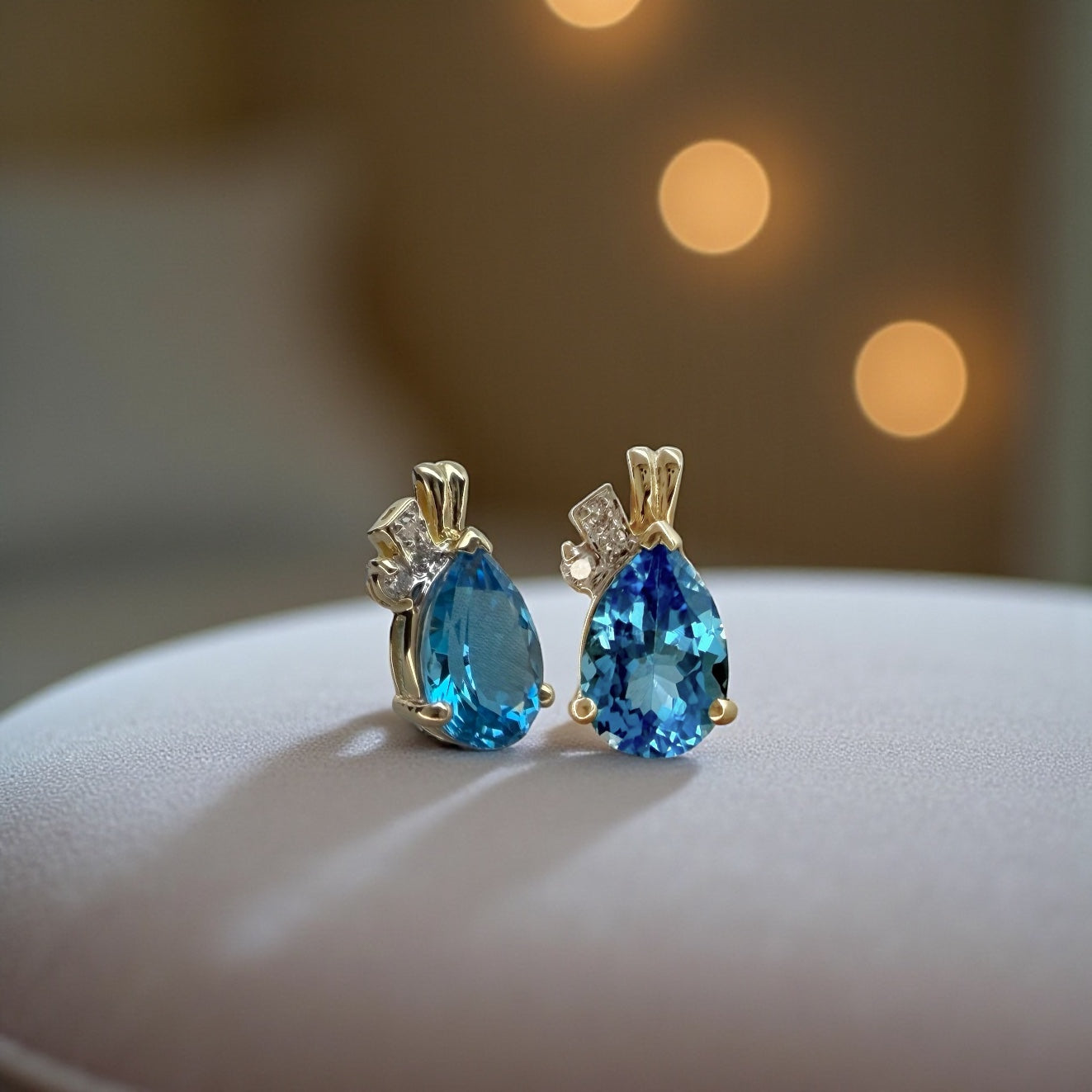 14K Blue Topaz Pear Shaped Earrings